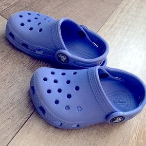 Gently used purple toddler crocs